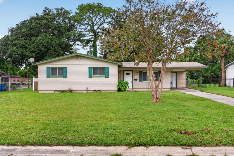 Front exterior with driveway at 2618 Arlex Dr E, Jacksonville, FL