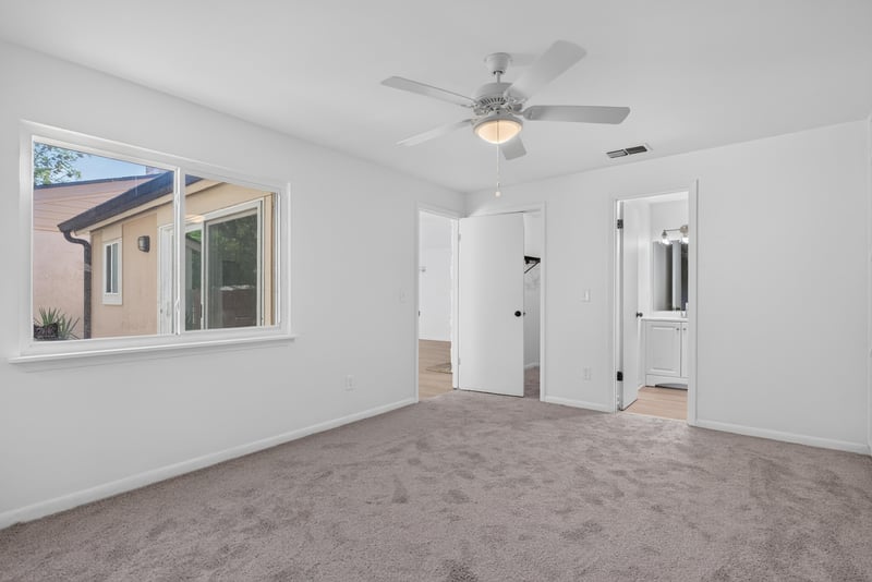Carpeted room with two windows, unfurnished at 8177 Virgo St, Jacksonville, FL 32216