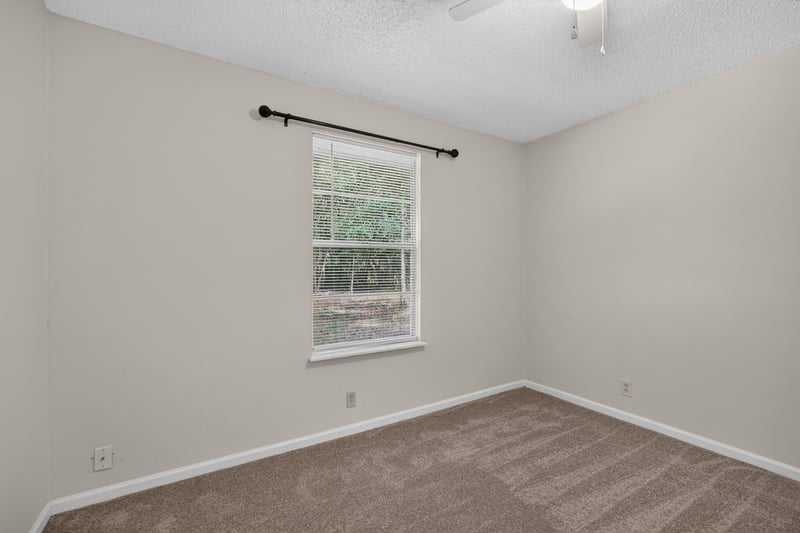 Bedroom with carpet and window at 2829 Blackberry Ave