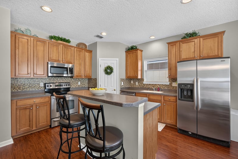 Kitchen with stainless steel appliances and tile backsplash at 3660 Middlebrook Dr, Orange Park, FL 32065