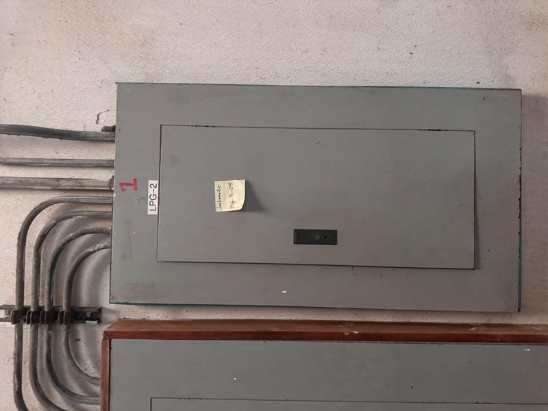 Panel door with handwritten circuit tag at 11700 New Kings Rd, Jacksonville, FL 32219