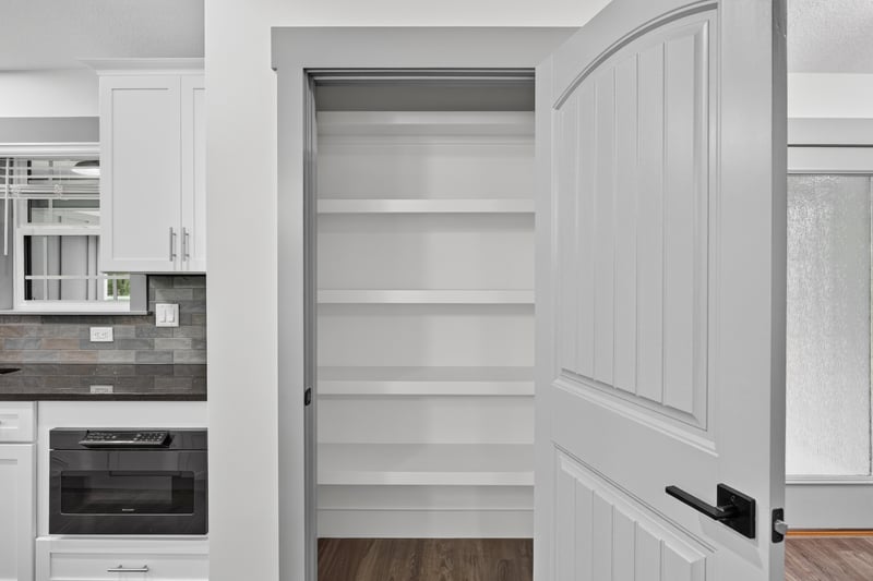 Pantry with built-in shelving at 4800 Acacia St, Middleburg, FL 32068