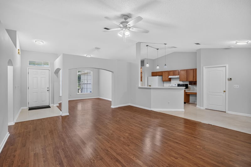 Living and dining area with wood floors at 9691 Nelson Forks Dr, Jacksonville, FL 32222