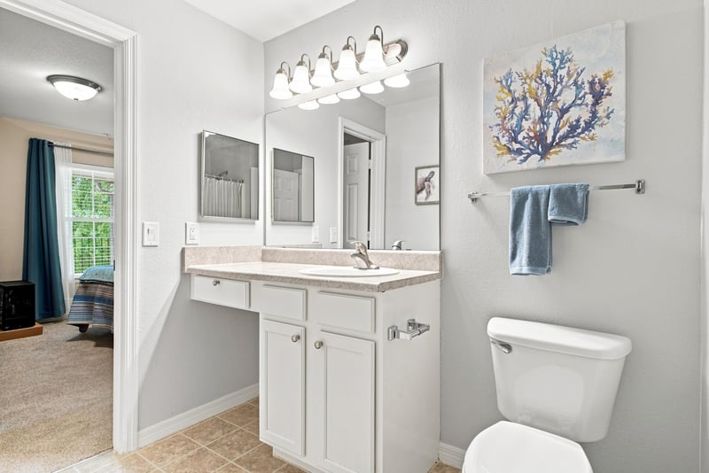 Bathroom with vanity and toilet at 7800 Point Meadows Dr, Jacksonville, FL 32256