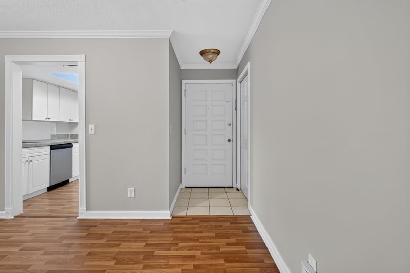 Hallway leading toward the kitchen at 3866 Campenero Ct unit 6, Jacksonville, FL 32217