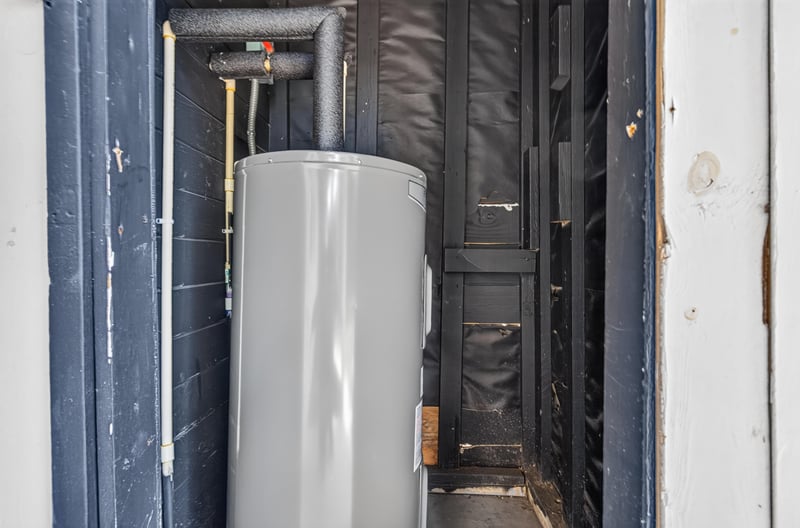 Water heater in utility closet at 855 Cornwallis Dr, Jacksonville, FL