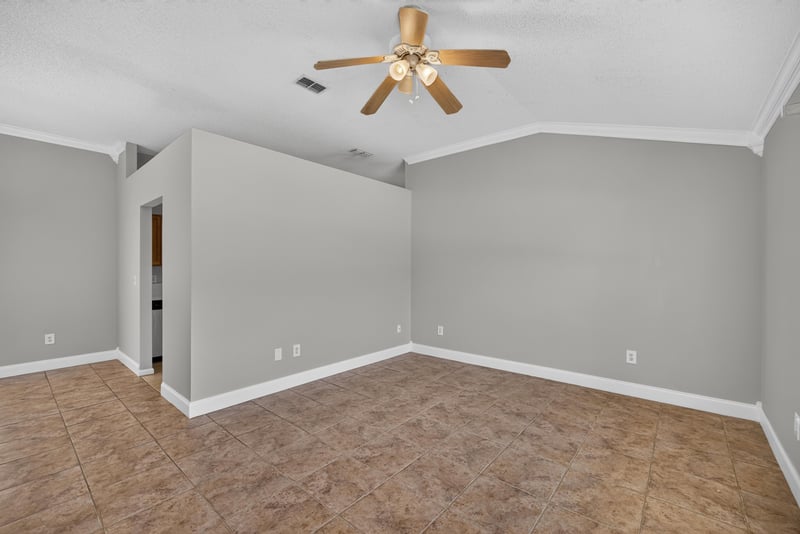 Empty entry room with tile floor and ceiling fan at 9256 Dale View Ln W, Jacksonville, FL 32225