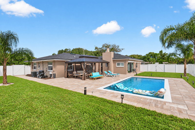 Aerial view of backyard pool and gazebo at 1525 8th St N, Jacksonville Beach, FL