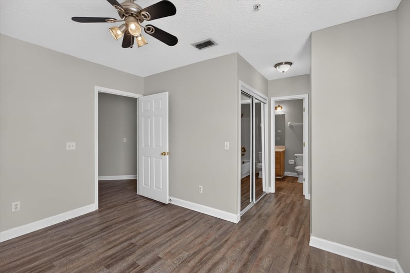 Room with closet doors at 1701 The Greens Way 1415, Jacksonville Beach, FL 32250
