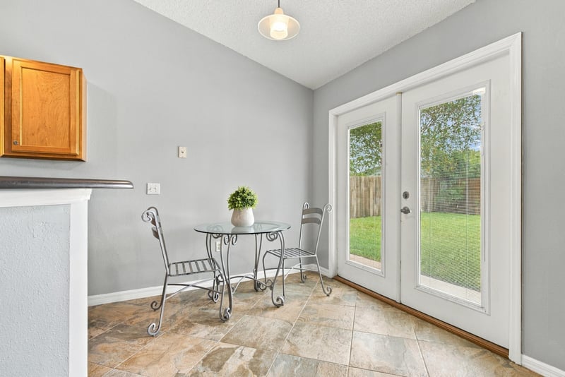 Breakfast nook with french doors to backyard at 11197 Illford Dr