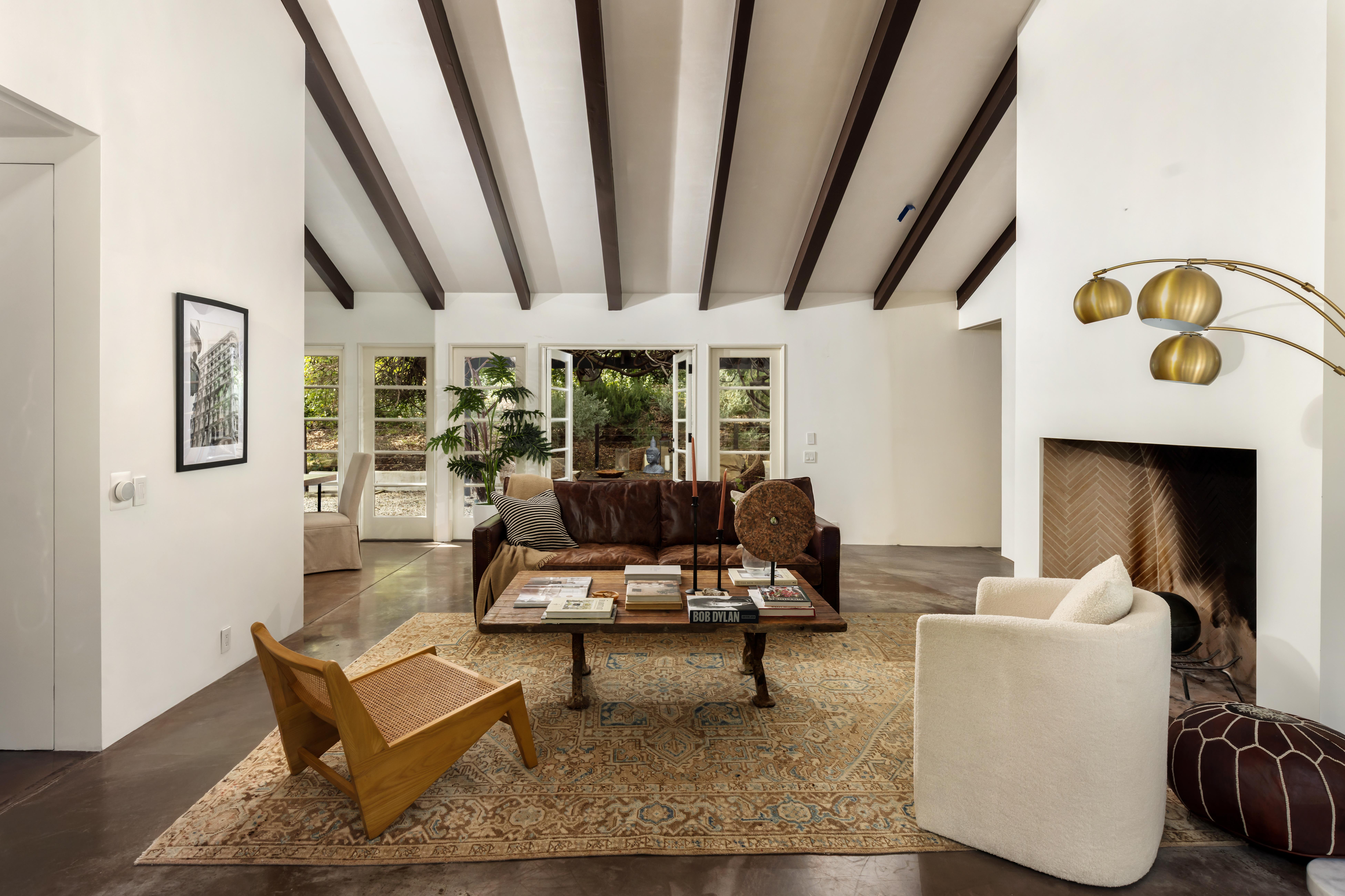 Living room interior of hillside estate at 647 Old Topanga Canyon Rd, Topanga — virtual tour photography highlighting warm natural light and refined finishes in this Los Angeles County canyon property. Our team captured still photography, a cinematic property video, a lifestyle video, an agent narration, a true vertical social media reel, and an FPV video tour throughout the midday.