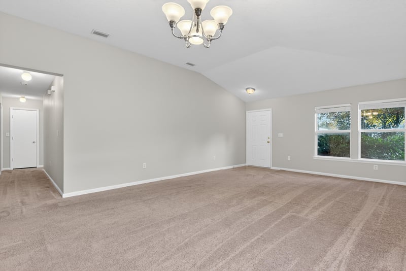 Living Room and Dining at 75277 Ravenwood Dr, Yulee, FL 32097