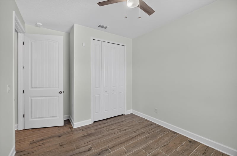Bedroom with closet at 855 Flach Dr, St. Johns, FL