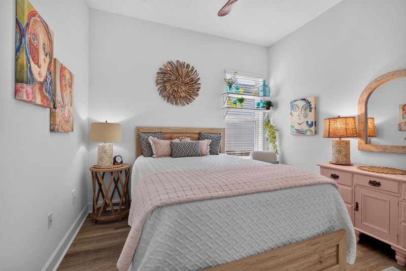 Bedroom with dresser and wall art at 129 Amberwood Dr, St. Augustine, FL