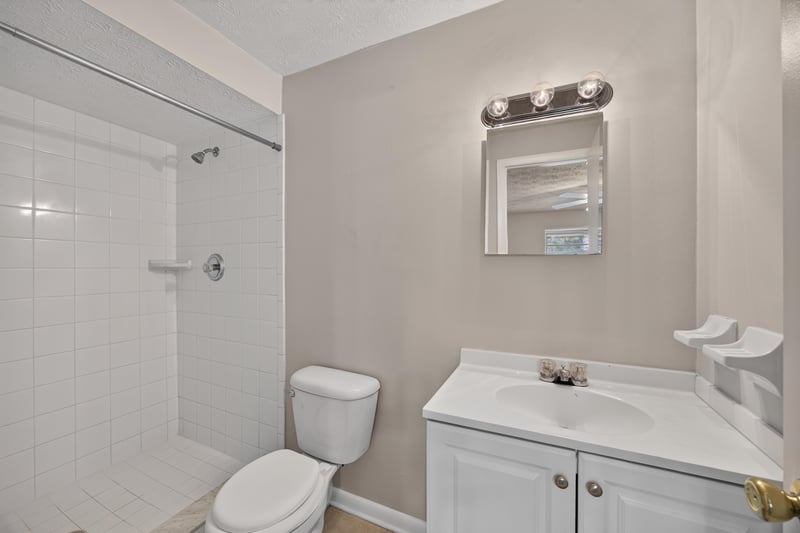 Bathroom with tub shower and vanity at 1143 Tumbleweed Dr, Orange Park, FL 32065