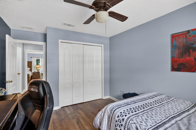 Bedroom with closet at 1589 Backwater Drive, Middleburg, FL 32068