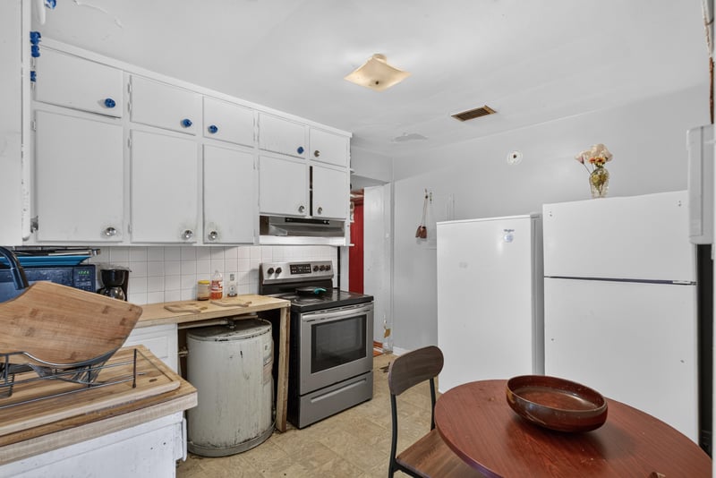 Kitchen with stove and refrigerator at 450 E 46th St, Jacksonville, FL 32208