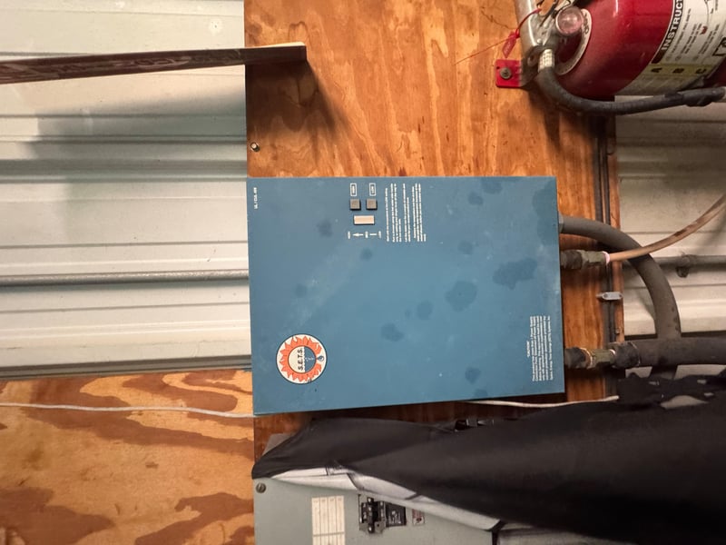 Electrical panel mounted on plywood backing at 11700 New Kings Rd, Jacksonville, FL 32219