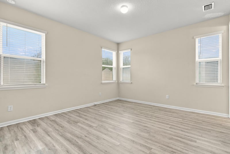 Bedroom corner with window at 7088 Mahogany Run Dr, Jacksonville, FL 32244