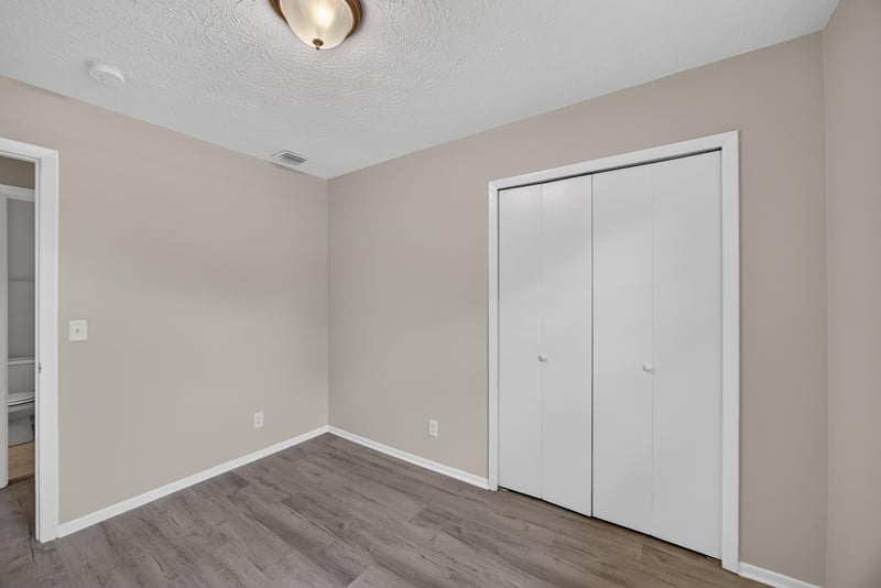 Empty bedroom with double closet doors at 1083 Stokes St, Jacksonville, FL