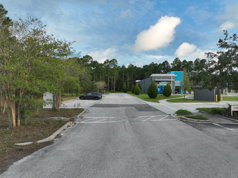 Ground-level view of the entrance drive and signage at 4900 US-1, St. Augustine, FL 32086