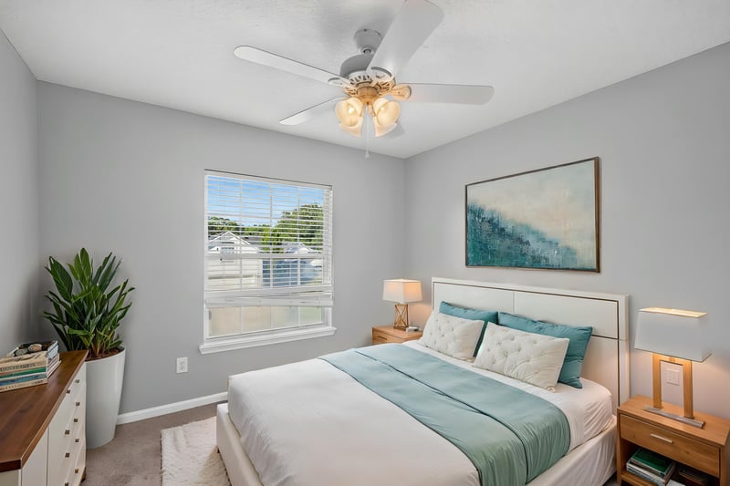 Bedroom staged with bed and ceiling fan at 470 Sparrow Branch Cir, Jacksonville, FL 32259
