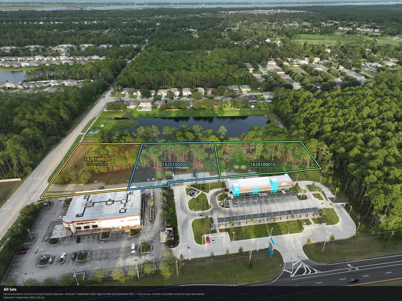 Aerial view of the commercial building and parking area beside the lot at 4900 US-1, St. Augustine, FL 32086
