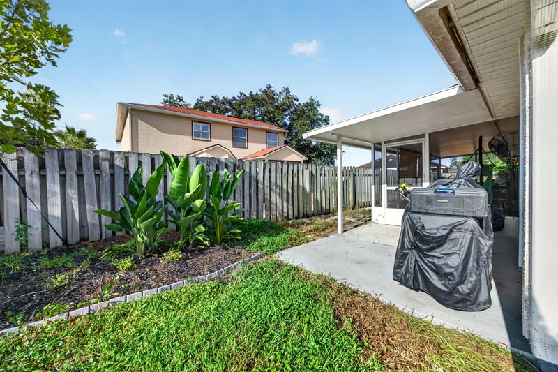 Backyard with fenced yard and patio at 12825 Kelsey Island Dr, Jacksonville, FL 32224