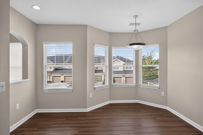 Breakfast area with bay window and pendant light at 3750 Silver Bluff Blvd, Orange Park, FL