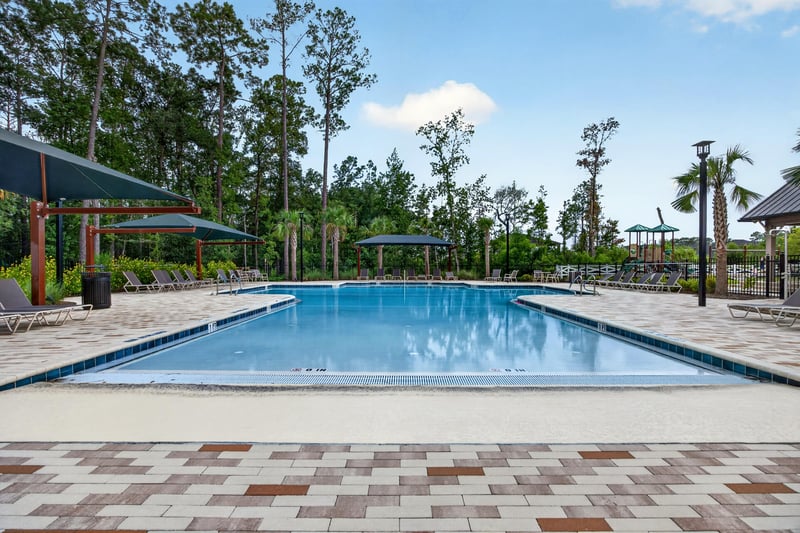 Community pool with paver deck in Middleburg, FL