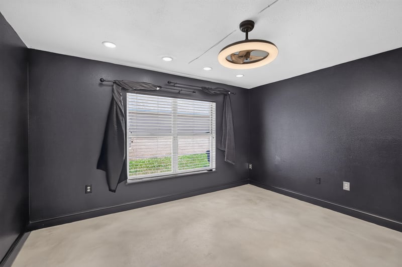 Bedroom with dark gray walls and window at 3428 Glenn Hollow Ct, Jacksonville, FL 32226