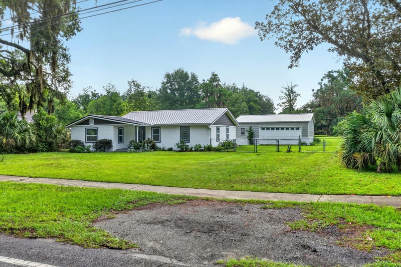 Street view of the home and driveway at 1619 Hammond Blvd, Jacksonville, FL