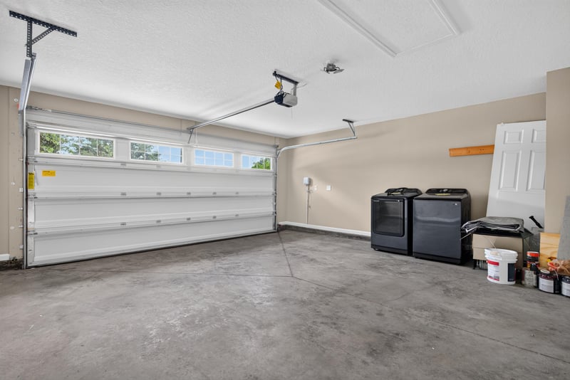 Garage interior with storage items at 7253 Townsend Village Ct, Jacksonville, FL