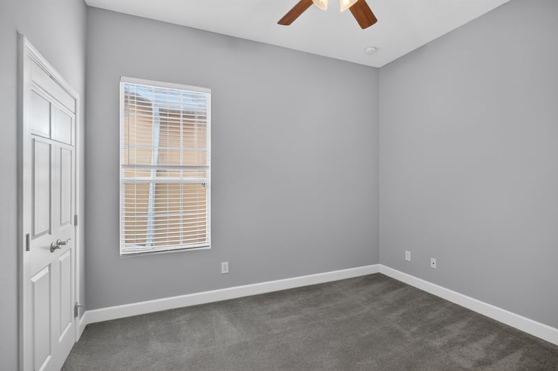 Bedroom with carpet and window at 6217 Eclipse Cir, Jacksonville, FL 32258