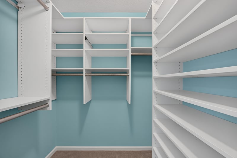 Walk-in closet with built-in shelving at 1955 GUARDED Way, Fleming Island, FL 32003