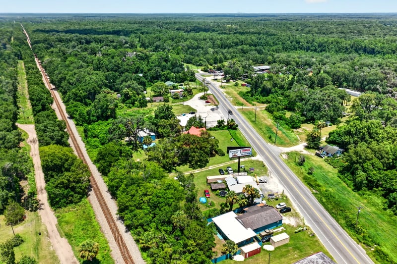 Aerial view of US-17 with a nearby lake in Satsuma, FL