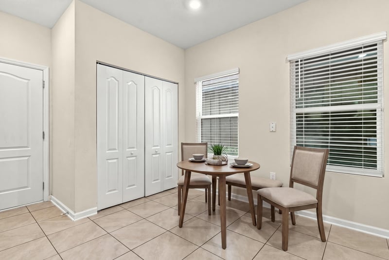 Empty flex room with closet doors and windows at 9555 Star Dr, Jacksonville, FL 32256