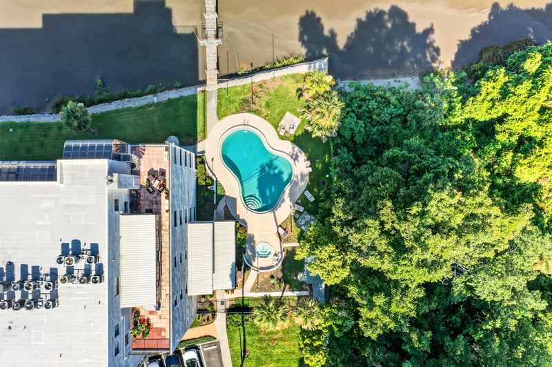 Aerial close view of pool and building in Jacksonville