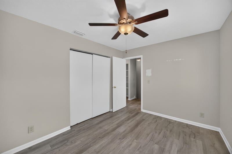 Bedroom with ceiling fan and double closet at 2658 Trollie Ln apt 1, Jacksonville, FL 32211