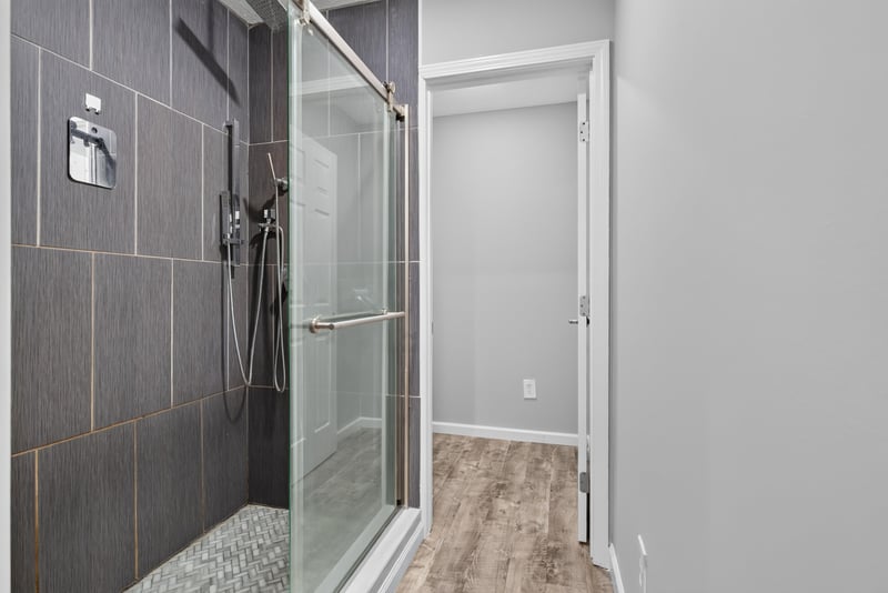 Primary bathroom tiled shower, photographed by Megapixeler on Birch Run E, Orange Park