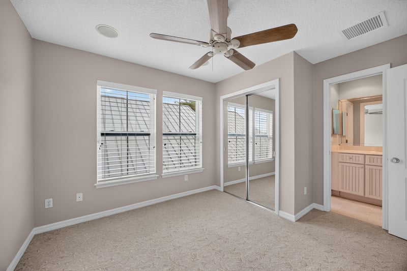 Empty bedroom with closet door at 117 Island Cottage Way, St. Augustine, FL 32080