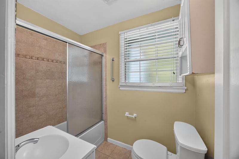 Bathroom with tub/shower combo and tile floor at 2841 Ernest St, Jacksonville, FL 32205