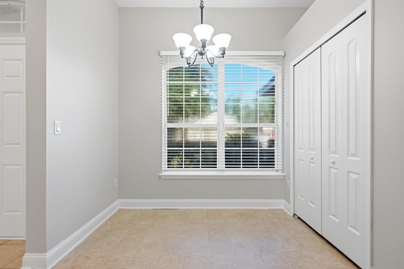 Dining nook with chandelier and plantation shutters at 14187 Big Spring St, Jacksonville, FL 32258