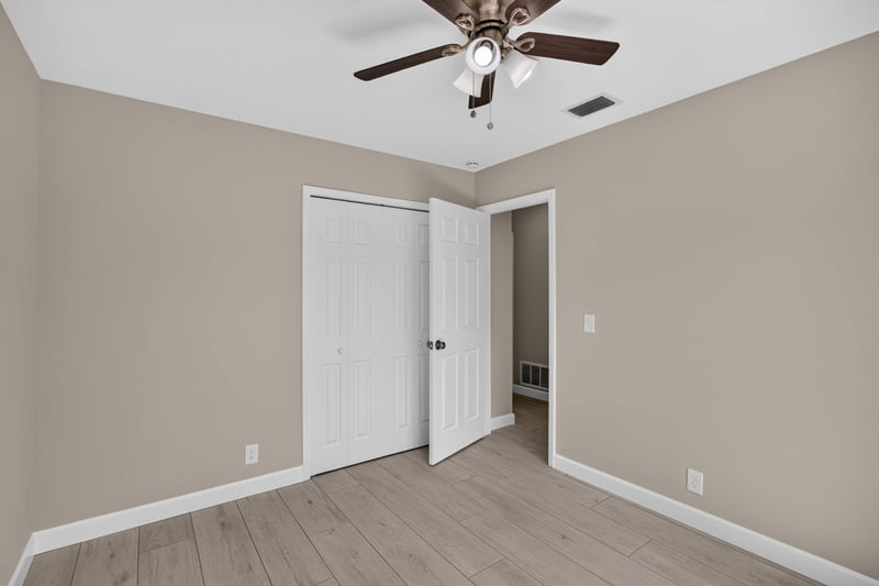 Empty bedroom with closet door at 4117 Wilcrest Ct, Jacksonville, FL 32277