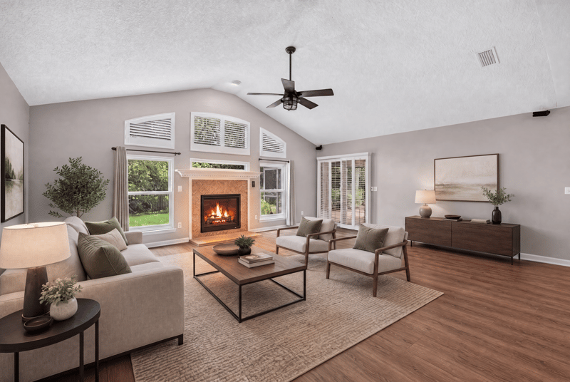 Living room with fireplace and furnished seating at 1955 GUARDED Way, Fleming Island, FL 32003