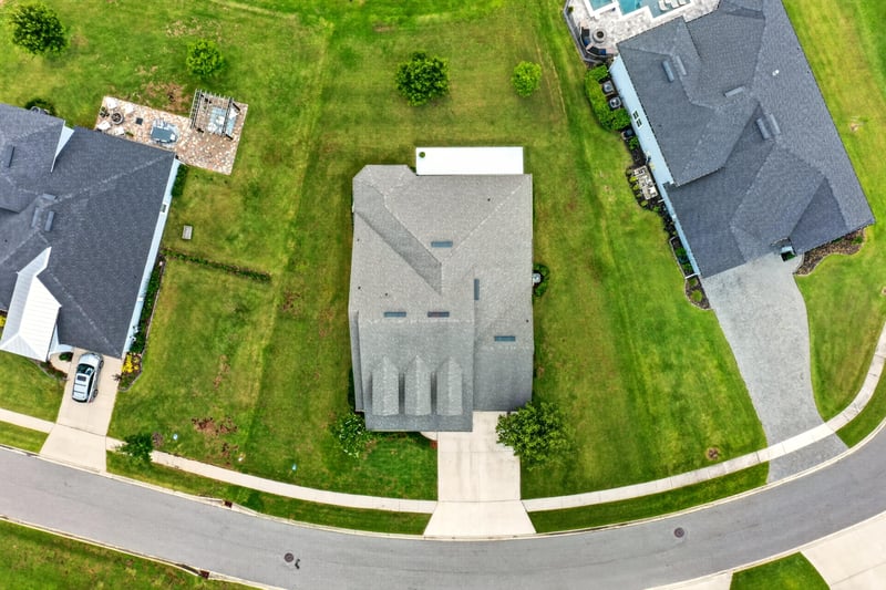 Top-down aerial view of roof and street at 53 Lumen Ct, St. Augustine, FL 32095