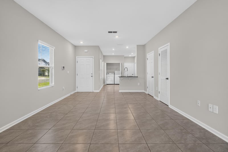 Open living space with sightline to kitchen at 4024 Bay Hawk Ct, Jacksonville, FL
