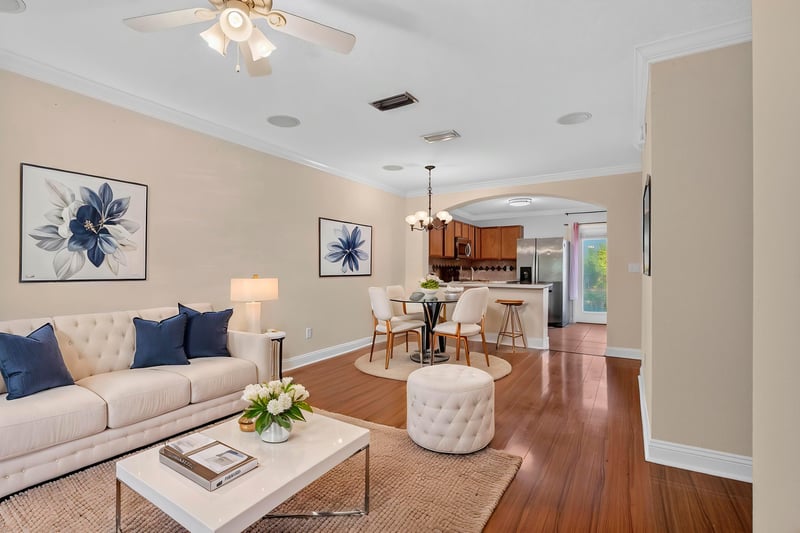 Living room virtually staged with sofa and coffee table at 353 Redwood Ln