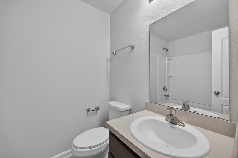 Bathroom with toilet and single-sink vanity at 2837 Black Buck Cir, Jacksonville, FL 32225