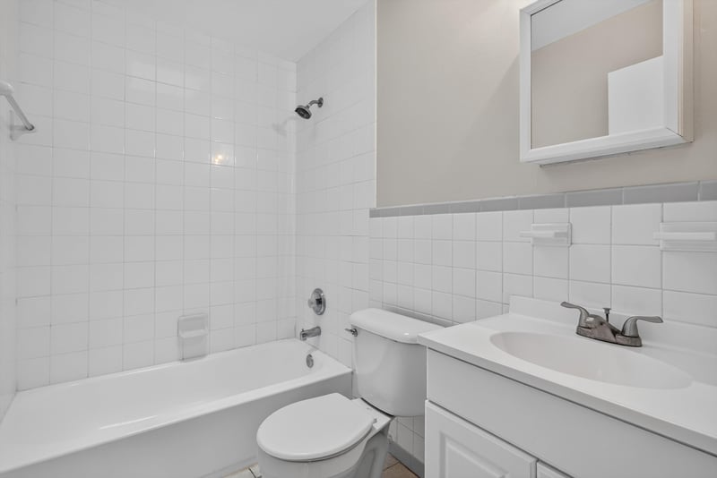 Bathroom with tub and sink at 2618 Arlex Dr E, Jacksonville, FL